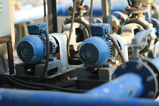 Row of blue motor-driven water pumps