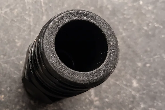 Inside of the same water line after Lotus treatment, clean to the wall
