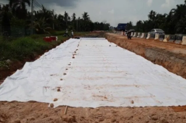 Geo-textile composite laid across a prepared strip